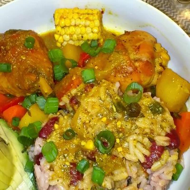Plated curry bowl with corn, cooked by Justine