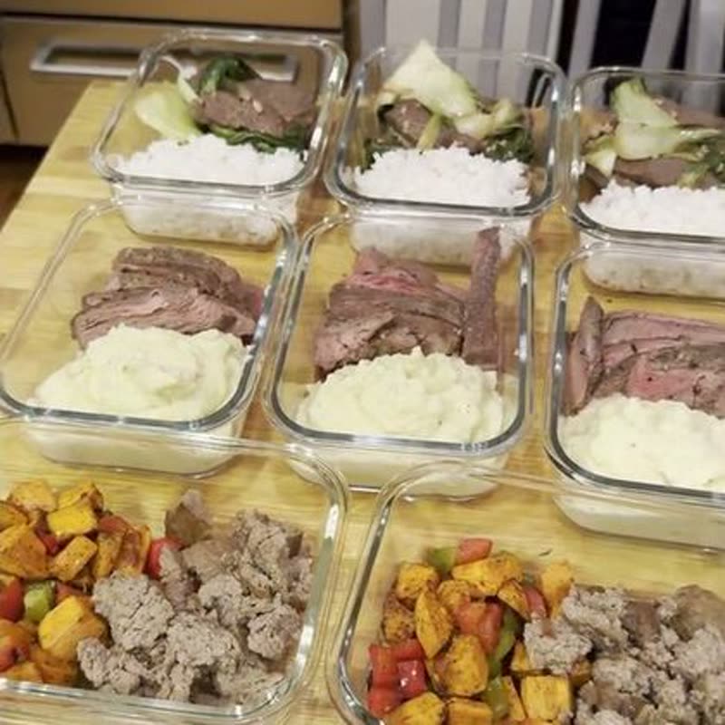 Four compartment meal with beef and vegetables
